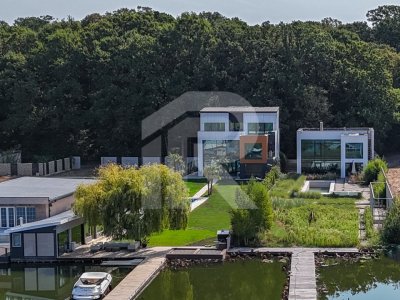 🏡 Reședință modernă 400 mp utili, teren 1.200 mp – deschidere directă la lac
