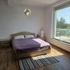 Apartament exclusivist în vilă | Vedere frontală la lac, curte proprie și ponton thumb 11