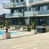 Apartamen cu acces DIRECT la PISCINA, curte proprie+parcare subterana inclusa! thumb 2