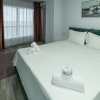Apartament la câțiva pași de plajă, cu vedere la mare thumb 7