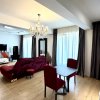 2 camere cu grădină privată de 50 mp de închiriat în Tunari  parcare inclusa thumb 2