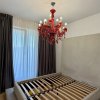 2 camere cu grădină privată de 50 mp de închiriat în Tunari  parcare inclusa thumb 7