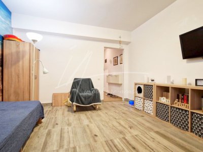 Garsonieră cochetă – Spațiu mic, confort mare!
